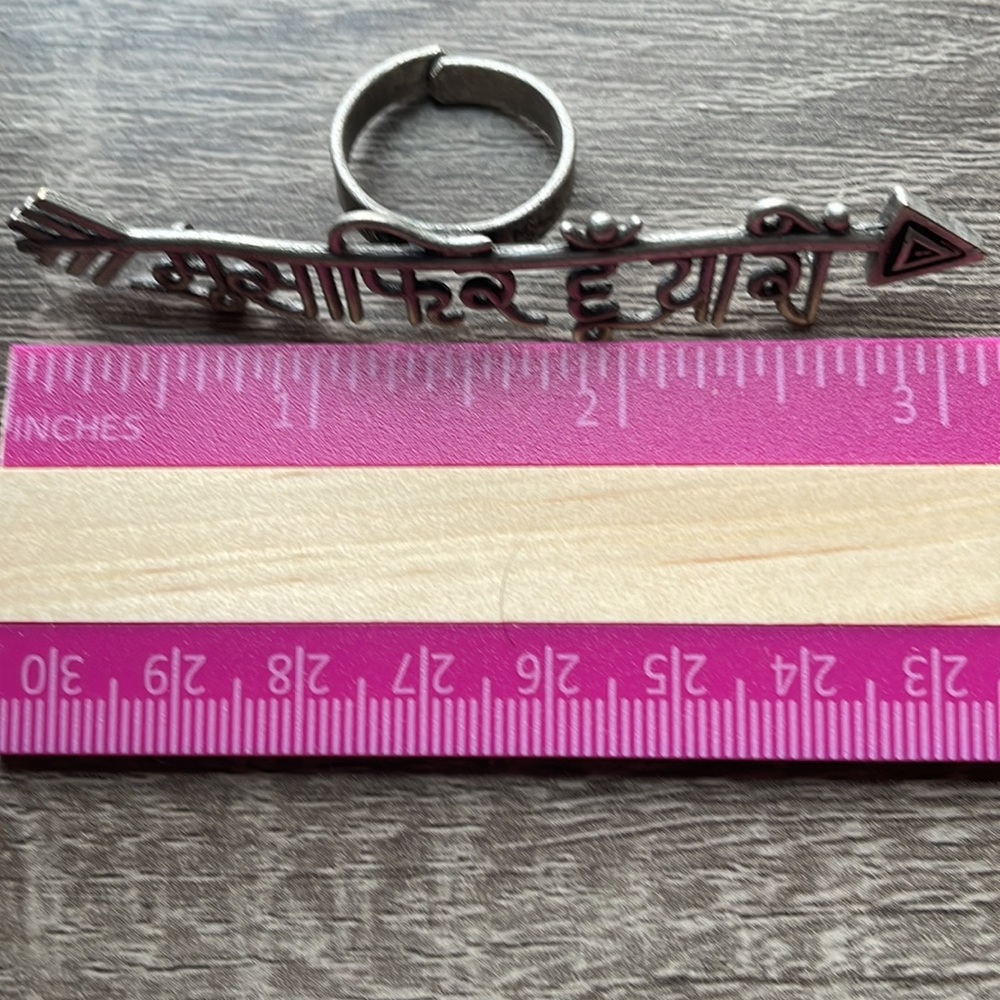 Archie Extra Long Scroll/letter Ring with Arrow design